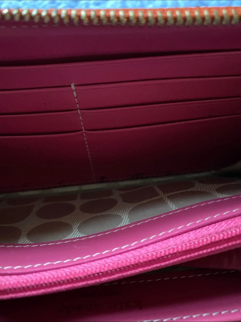 kate spade orange  Leather Zip Around Wallet with Gold Logo with pink inside
